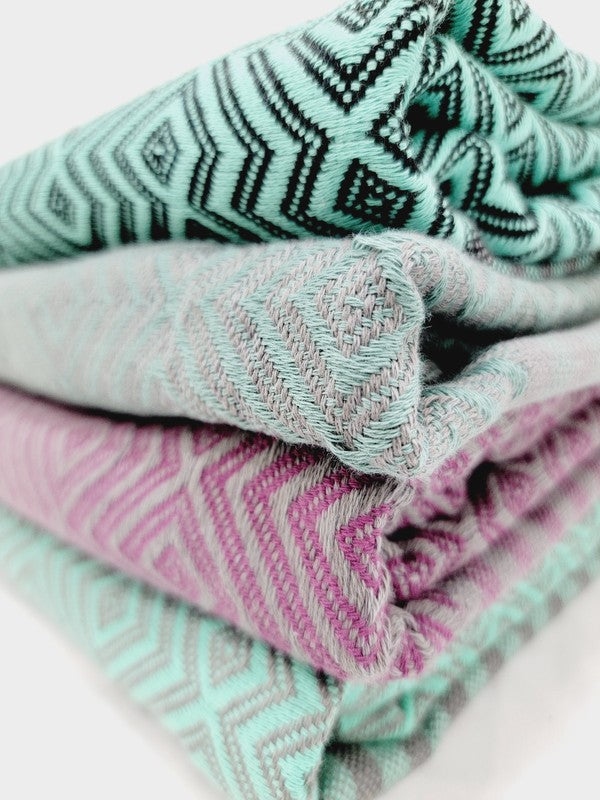 Geo Stripe Turkish towels in assorted colors.