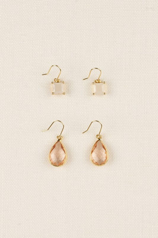 Light pink and peach gold rimmed stone earring set. 