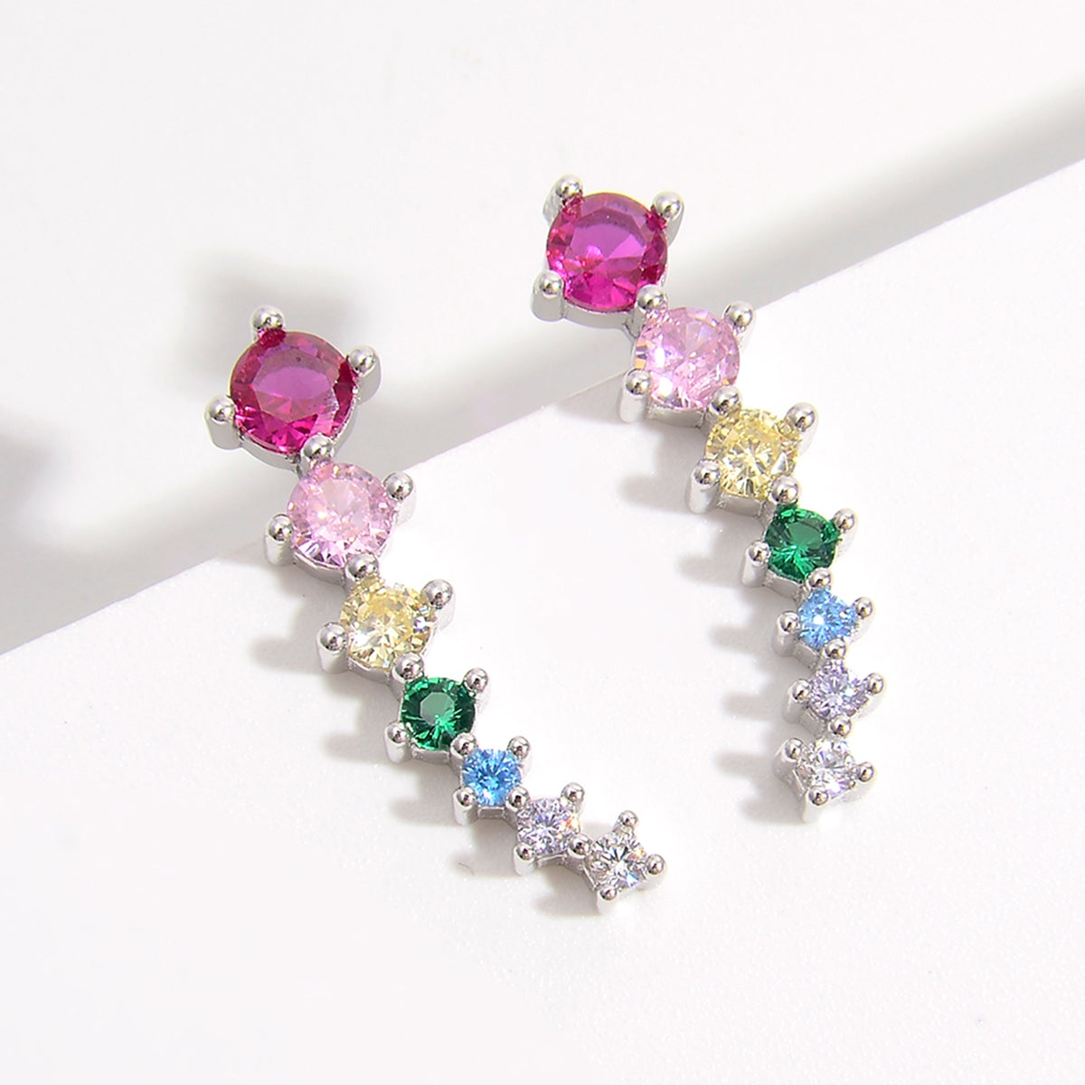 Get sassy and sparkly for Pride month with these adorable rainbow journey earrings crafted in zircon inlaid into 925 sterling silver.
