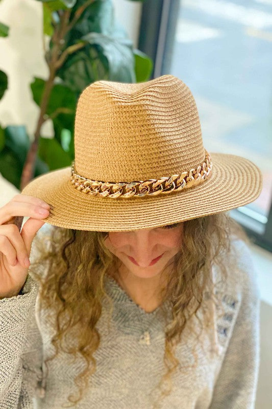 Straw Cuban Chain hat in a fedora style.