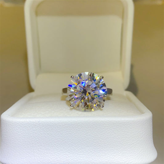 Stunning 10-Carat solitaire Moissanite ring set in  925 Sterling silver in a white ring box.