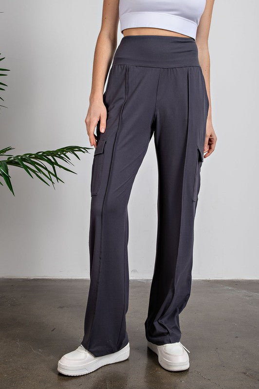 Butter soft straight leg cargo pants made from microfiber for softness and stretch in dark grey against a white background.