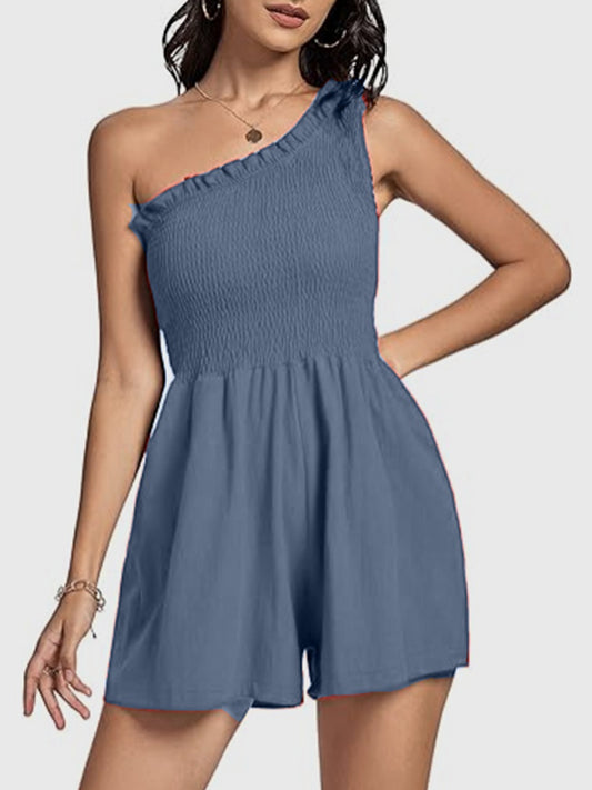 Upgrade your summer wardrobe with our Smocked Single Shoulder Romper. Made with 100% Rayon, this romper offers a loose-fit bottom and a smocked top for ultimate comfort. Perfect for any occasion, dress it up or down and take it with you on all your travels. Available in four colors.