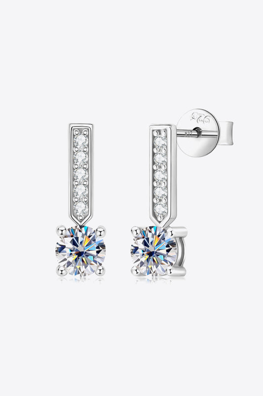 Sterling silver and Moissanite drop earrings on a white background