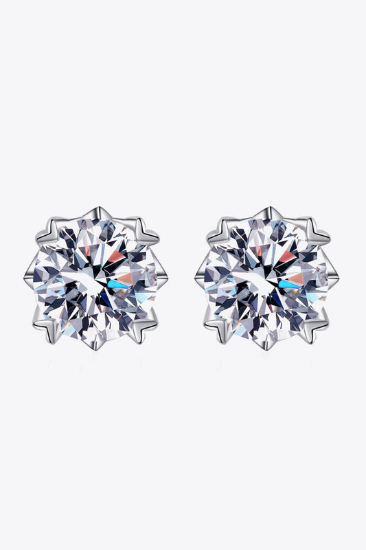 2 carat each Moissanite earrings set in sterling silver on a white background